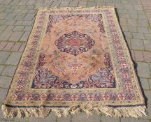 Beige ground Middle Eastern rug 204cm by 127cm