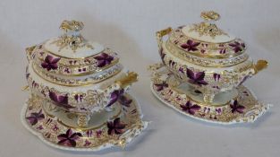 Pair of 19th century lidded tureens on stands, the lids surmounted by a moulded finial, with puice