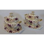 Pair of 19th century lidded tureens on stands, the lids surmounted by a moulded finial, with puice