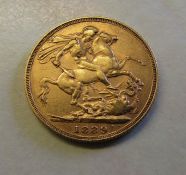 Victorian 1889 full gold sovereign with white metal sovereign case