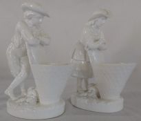 A pair of Minton blanc de chine figural salts with impressed mark to base height 23cm