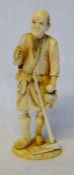 Ivory Meiji period okimono of a farmer with pipe Ht 18.5cm