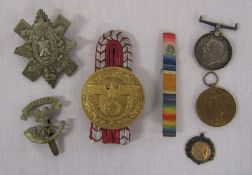Selection of militaria inc medals, badges (possibl