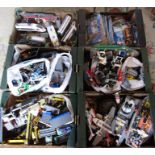 Large quantity of Lego including boats, trains, train station, police, construction vehicles,
