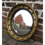 Gilt framed circular mirror