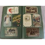 Postcard album containing 400 greeting postcards dating from the early 1900s onwards inc wedding,