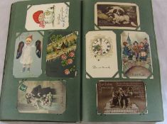 Postcard album containing 400 greeting postcards dating from the early 1900s onwards inc wedding,