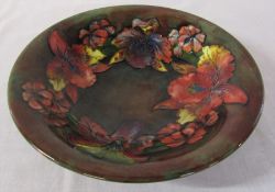 Moorcroft flambe effect orchid pattern bowl initialled and signed W Moorcroft to underside D 24.5 cm