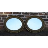 Pair of oval gilt framed mirrors