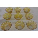 Set of 9 Bohemian amber cut through to clear glass bowls decorated with stags, floral cartouches and