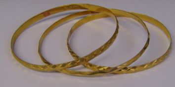 3 tested as 18ct gold (minimum) bangles wt approx. 28.5g