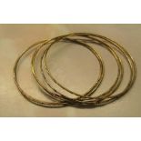 6 gold bangles marked 14K weight 11.9 g