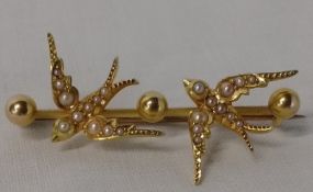 Tested as 14ct gold seed pearl set twin Swallow brooch wt 4.8g