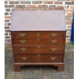 Georgian oak bureau on bracket feet