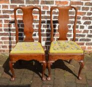 Pair of early Georgian mahogany dining chairs on cabriole legs