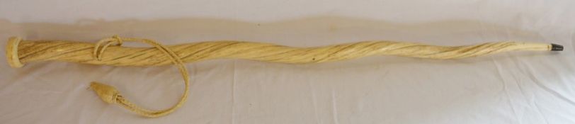 Narwhal tusk walking stick with turned flat pommel. Length approx. 94cm Weight approx 1.05kg with