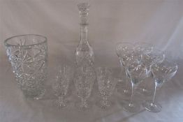 Selection of cut glass including a decanter, 6 wine glasses, vase and plain 6 wine glasses