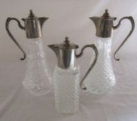 3 silver plate and glass claret jugs H 30 cm and 23 cm