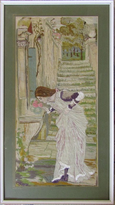 Framed 19th century tapestry of a woman smelling flowers 33 cm x 59.5 cm (size including frame)