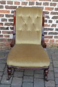 Victorian button back nursing chair with turned mahogany legs