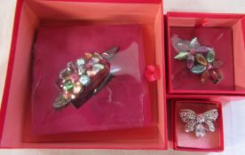 3 pieces of Butler and Wilson jewellery (2 still sealed) - all hair accessories