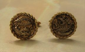 Pair of 14ct gold dragon cufflinks marked 585 total weight 9.2 g