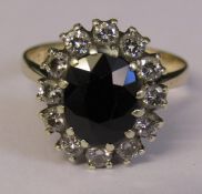 9ct gold sapphire and diamond cluster ring size K/L sapphire 2.4 ct diamond total 0.42 ct total