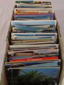 Box containing approximatley 600 contemporary / modern overseas postcards