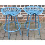 Pair of metal tractor seat style bar stools