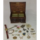 Carved oak box containing selection of costume jewellery, 22ct gold wedding ring, silver bar brooch,