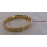 9ct gold bangle 7 cm x 6.5 cm weight 28.2 g