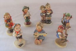 7 Goebel hummel figures of children (1 with chip to hair)