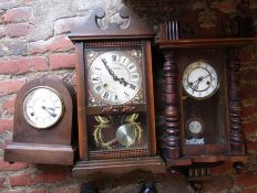 2 wall clocks and a mantel clock