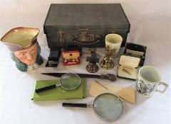 Small vintage suitcase containing large Royal Doulton Vicar of Bray character jug, Zippo lighter,