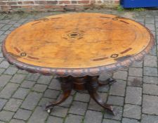 Victorian tilt top table with mixed wood marquetry to top