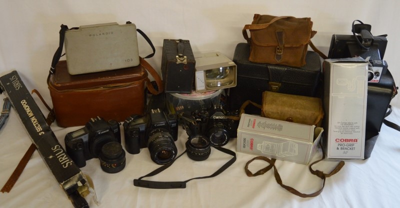 Large quantity cameras & camera equipment including Canon A1 & two EOS 1000F cameras, Polaroid 103 &