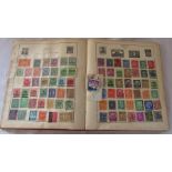 Vintage stamp album containing World stamps