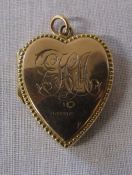 9ct gold locket Birmingham hallmark weight 4.3 g (engraved) H 2.5 cm