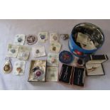 Selection of vintage Isle of Man TT pin badges, tie clips etc