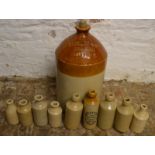Various stoneware bottles including N E Knight Brigg