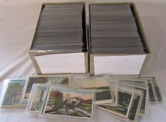 2 boxes containing approximately 1000 postcards relating to the United States including some from