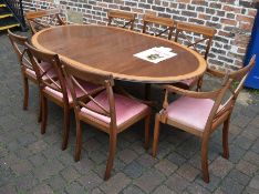 Martin J Dodge Regency style dining table and 8 rail back chairs inc 2 carvers in mahogany with