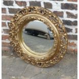 Gilt framed circular wall mirror