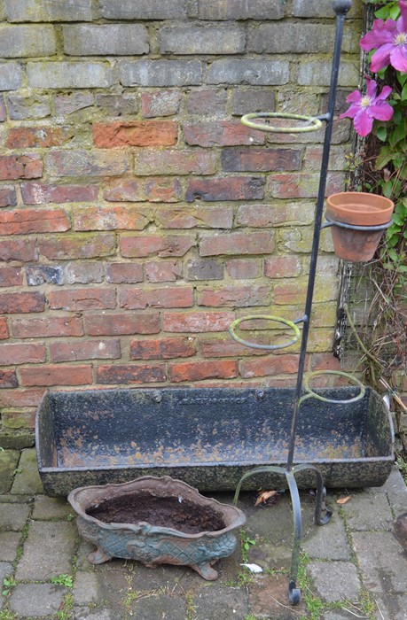 Cast iron pig trough, planter and wrought iron plant stand