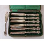 Cased set of silver handled knives Sheffield 1911 and a silver butter knife Sheffield 1911 weight