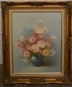 Oil on canvas still life of flowers in a vase signed T Matthews. Frame size 67cm by 57cm