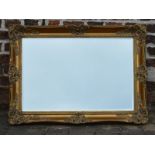 Ornate gilt frame wall mirror 93cm by 67cm