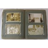 Postcard album containing approximately 120 real photo postcards relating to social history inc
