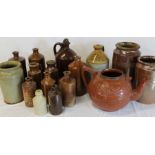 Selection of salt glazed stoneware including ink bottles, large teapot & Booth & Co Leeds flagon