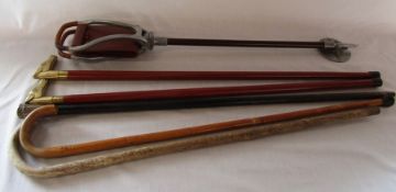 Selection of walking sticks & a shooting stick